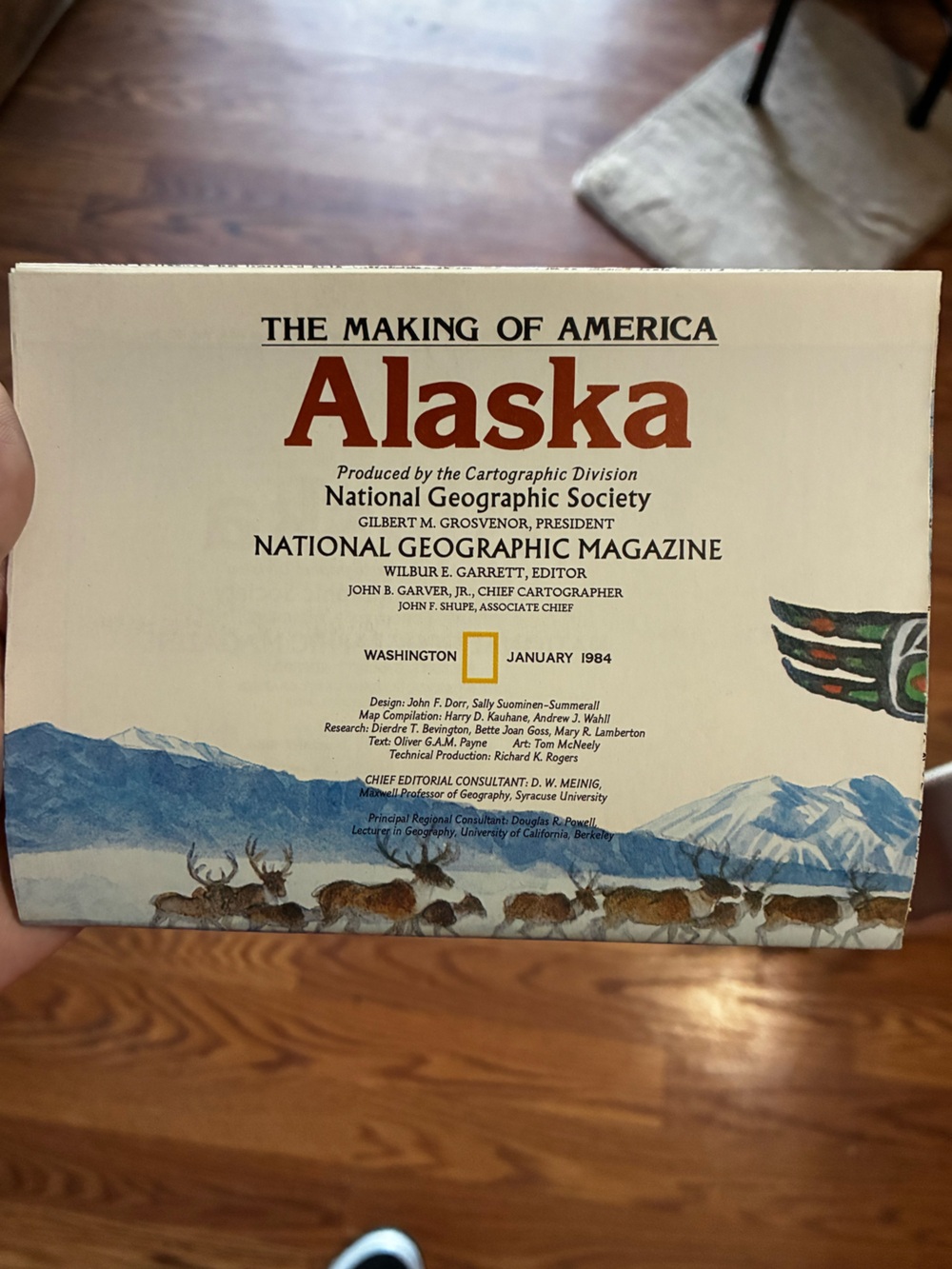 National Geographic Alaska Cover with Blue Mountains and Red Title Map